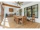 Spacious screened porch with a dining table, and an outdoor kitchen with built in grill at 445 Roper Rd, Canton, GA 30115