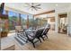 Relaxing screened porch with ceiling fan, fireplace and view of the backyard at 445 Roper Rd, Canton, GA 30115