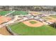 Aerial view of a well-maintained sports complex with baseball fields, and green playing fields at 445 Roper Rd, Canton, GA 30115