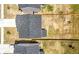 Aerial view of a home showing the roof and surrounding yard and neighborhood at 1961 Vidalia Ct, Dacula, GA 30019