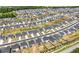Community aerial view showcasing the neighborhood layout and vast number of homes at 1961 Vidalia Ct, Dacula, GA 30019