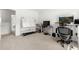 Bright open office space with neutral carpet, and desk at 1961 Vidalia Ct, Dacula, GA 30019