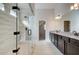 Hallway bathroom featuring glass shower, granite countertop, and double sink vanity at 3900 Ivy Cottage Dr, Snellville, GA 30039