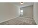 Bedroom with neutral walls, carpet, and a window with blinds at 3900 Ivy Cottage Dr, Snellville, GA 30039