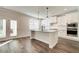 Bright kitchen featuring a center island, stainless steel appliances, and a view of the yard at 3900 Ivy Cottage Dr, Snellville, GA 30039