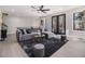 Stylish living room featuring a comfortable sofa, modern decor, and large windows at 608 S Evelyn Nw Pl, Atlanta, GA 30318