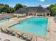Beautiful community pool area with lounge chairs and a splash area for  at 7545 Brookwood Way, Cumming, GA 30041