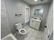Stylish bathroom featuring a modern vanity, illuminated mirror, and elegant fixtures for a luxurious experience at 2040 Penelope Nw St, Atlanta, GA 30314