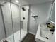 Bathroom featuring modern double vanity, and updated shower at 2040 Penelope Nw St, Atlanta, GA 30314