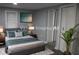 Cozy bedroom featuring a comfortable bed, stylish decor, and ample natural light for a relaxing ambiance at 2040 Penelope Nw St, Atlanta, GA 30314