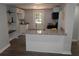 Modern kitchen with granite countertops, stainless steel sink, and a convenient island at 2040 Penelope Nw St, Atlanta, GA 30314