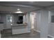 Updated kitchen featuring granite countertops, modern appliances and new flooring at 2040 Penelope Nw St, Atlanta, GA 30314