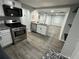 Modern kitchen with stainless steel appliances, granite countertops, and an open layout perfect for entertaining at 2040 Penelope Nw St, Atlanta, GA 30314