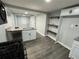 Updated kitchen featuring granite countertops, modern appliances and new flooring at 2040 Penelope Nw St, Atlanta, GA 30314