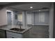 Open concept kitchen with granite countertops and stainless steel dishwasher at 2040 Penelope Nw St, Atlanta, GA 30314