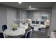 Stylish living and dining area with modern decor, comfortable seating, and ample natural light for a welcoming atmosphere at 2040 Penelope Nw St, Atlanta, GA 30314