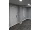 Versatile room featuring neutral gray walls and flooring, a closet, and window that offers natural light at 2040 Penelope Nw St, Atlanta, GA 30314