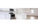 Stylish kitchen featuring stainless steel appliances, an island, and ample storage at 27 Hazel St, Porterdale, GA 30014