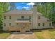 Large home with a backyard and deck for outdoor living at 552 Steels Bridge Rd, Canton, GA 30114