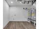Unfinished basement with wood floors and utility hookups at 552 Steels Bridge Rd, Canton, GA 30114