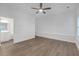 Bedroom with a new ceiling fan, floors, and an ensuite bathroom at 552 Steels Bridge Rd, Canton, GA 30114
