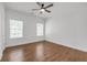 Bright bedroom with hardwood floors and natural light, freshly painted and ready to move in at 552 Steels Bridge Rd, Canton, GA 30114