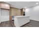 Kitchen featuring a large island, custom cabinets, and modern appliances at 552 Steels Bridge Rd, Canton, GA 30114