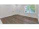 Bright room featuring new floors, fresh paint, and natural light at 552 Steels Bridge Rd, Canton, GA 30114