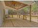 Inviting covered back porch overlooking a private backyard at 552 Steels Bridge Rd, Canton, GA 30114