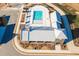 Aerial view showcasing the community pool with an adjacent structure and surrounding landscaping at 6775 Pippin Walk, Alpharetta, GA 30005