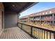Private deck with a view of charming townhomes and meticulously manicured landscaping at 6775 Pippin Walk, Alpharetta, GA 30005