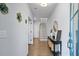 Bright foyer featuring a staircase, wood floors, and decorative accents on the wall at 6775 Pippin Walk, Alpharetta, GA 30005
