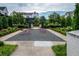 Enjoy community greenspace with paved walking paths, garden beds, and outdoor seating at 6775 Pippin Walk, Alpharetta, GA 30005