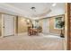 Finished basement with dining area, carpeted floors, recessed lighting, and neutral paint at 2551 Raintree Ne Dr, Atlanta, GA 30345
