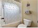 Full bath with a unicorn-themed shower curtain and a toilet at 2551 Raintree Ne Dr, Atlanta, GA 30345