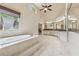 Open bathroom with vaulted ceilings, a soaking tub, dual sinks, and a walk-in shower at 2551 Raintree Ne Dr, Atlanta, GA 30345