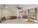 Spacious bonus room with carpet, neutral colors and multiple windows at 2551 Raintree Ne Dr, Atlanta, GA 30345