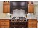 Well-equipped kitchen showcasing stainless steel appliances, custom cabinets, and granite countertops at 2551 Raintree Ne Dr, Atlanta, GA 30345