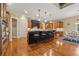 Gourmet kitchen featuring an island with bar seating, stainless appliances, and custom cabinetry at 2551 Raintree Ne Dr, Atlanta, GA 30345