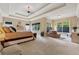 Expansive main bedroom featuring tray ceilings, ample natural light, and neutral color palette at 2551 Raintree Ne Dr, Atlanta, GA 30345
