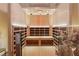 Inviting home sauna featuring wood paneling, built-in benches, and ambient lighting at 2551 Raintree Ne Dr, Atlanta, GA 30345