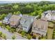 Beautiful aerial view of homes with lush landscaping and tree-lined streets at 4020 Declaration Dr, Roswell, GA 30076