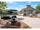 Community pool area with lounge seating and a pavilion with outdoor grill at 4020 Declaration Dr, Roswell, GA 30076