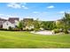 A charming community space with ample greenery and a paved courtyard area, perfect for gatherings and relaxation at 4020 Declaration Dr, Roswell, GA 30076