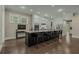 Spacious kitchen features a large island with seating, stainless steel appliances, and ample cabinet space at 4020 Declaration Dr, Roswell, GA 30076