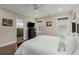 This primary bedroom features hardwood floors, natural light and neutral paint with an ensuite bathroom at 4020 Declaration Dr, Roswell, GA 30076