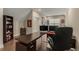 Inviting home office featuring hardwood floors, a large desk, and ample storage at 4020 Declaration Dr, Roswell, GA 30076