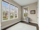 Bright office space with natural light streaming through large windows and hardwood floors at 4020 Declaration Dr, Roswell, GA 30076