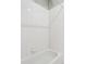 Clean white tiled tub and shower in this bathroom at 4746 Chamblee Dunwoody Rd, Atlanta, GA 30338