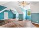 Spacious bedroom with vaulted ceilings, a ceiling fan, and hardwood flooring throughout at 10192 Shallowford Rd, Roswell, GA 30075